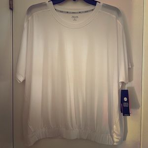 XL Zelos white shirt w/ elastic ban. New.